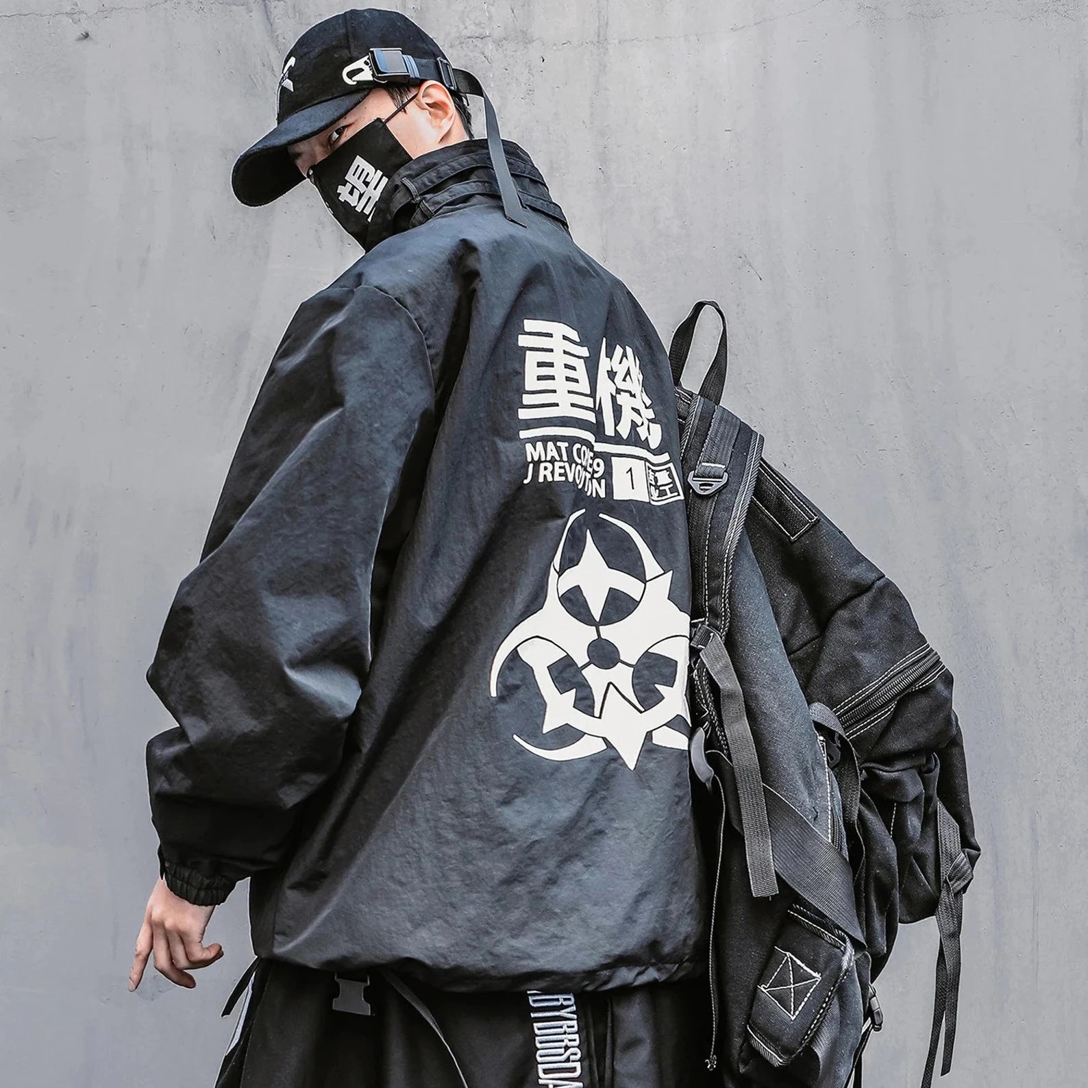 man wearing a techwear jacket