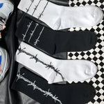 barbed wire socks - Vignette | OFF-WRLD