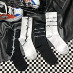 barbed wire socks - Vignette | OFF-WRLD