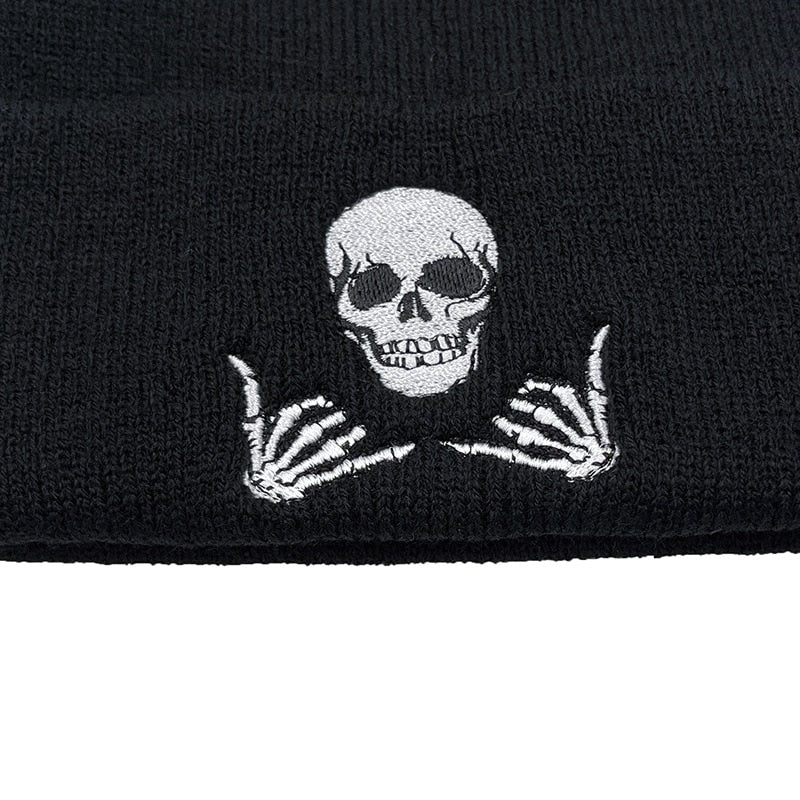 black beanie with skull